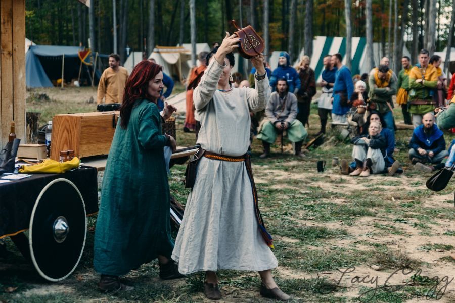 Raising a pouch during a camp ceremony