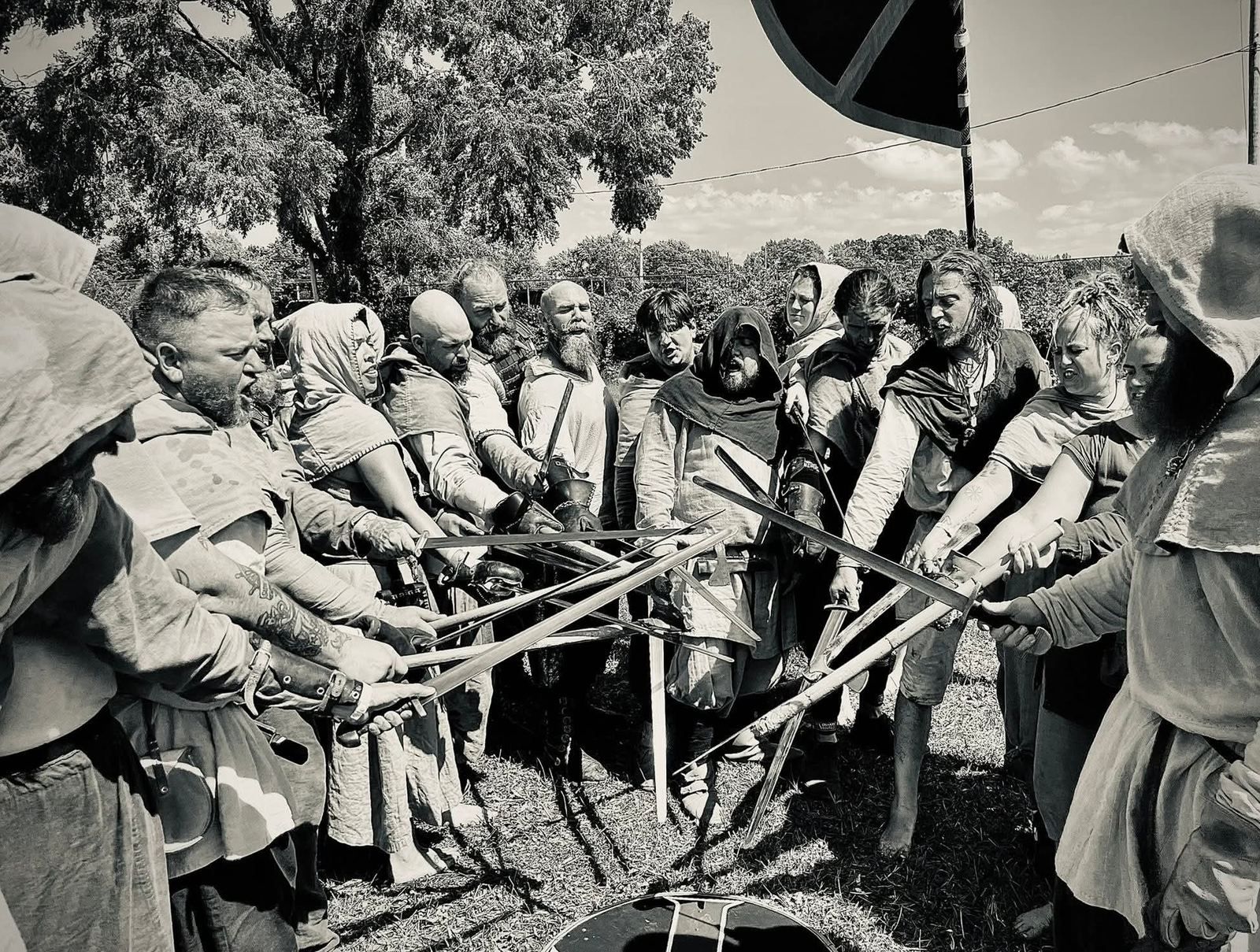 Brotherhood oath — swords crossed in a circle