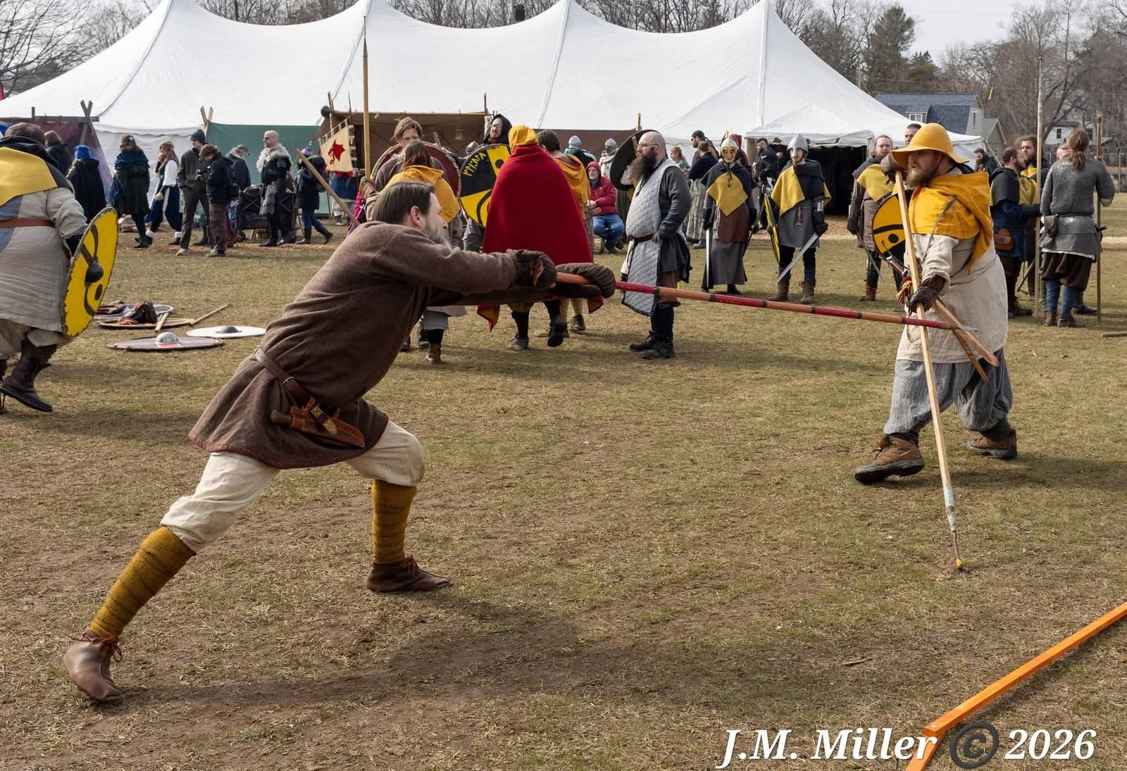 Spear bout with crowd watching