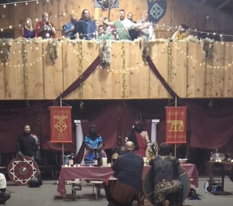 Boston War Games inside the longhouse with battle banners